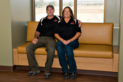 Photo of Randy and Betsy on custom seating